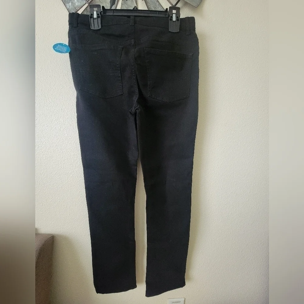 The children place Black super skinny jeans size 16 Husky.